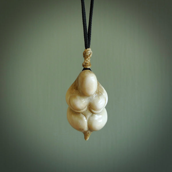 Hand carved large Blomi Goddess pendants carved from Deer Antler. Large deer antler bone carving of a female goddess. Unique are to wear. We provide these on adjustable cords and shipping is included in the price.