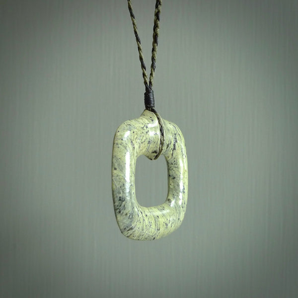 Hand carved Jade contemporary pendant. Carved by NZ Pacific in jade from Burma. This is a modern, contemporary pendant made from natural materials.