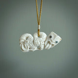 Hand carved tiki. Tiki Pendant made from deer antler by NZ Pacific. Ethnic handcarved jewellery for sale online.