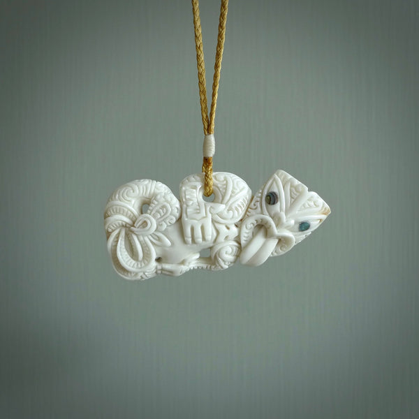 Hand carved tiki. Tiki Pendant made from deer antler by NZ Pacific. Ethnic handcarved jewellery for sale online.