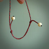 Mammoth beads on the end of the adjustable cord.