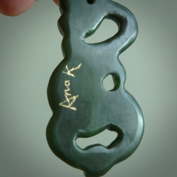 This is a large sized Manaia - carved from gorgeous Marsden jade. The craftsmanship is superb, this piece is as well carved as any we have seen. The cord is an adjustable four plaited cord in black. One only by Ana Krakosky.