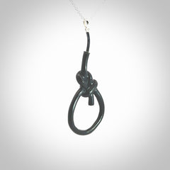 A gorgeous hand carved black jade bowline knot pendant with sterling silver. Hand made in Black Jade with Sterling Silver and provided with sterling silver chain.