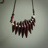 Red Jasper Stone drop pendant. Australian Black Jade drop pendant Handmade black jade and Jasper jewellery made by NZ Pacific and for sale online. Jasper stone for men and women. Unique art to wear from NZ Pacific.