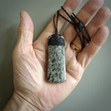 Hand made large New Zealand jade toki pendant. Hand carved in New Zealand by Raegan Bregmen . Hand made jewellery. Unique large Jade Toki with adjustable length black coloured cord. Free shipping worldwide.