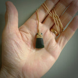 Hand carved jade toki by Ric Moor. Made in New Zealand by NZ Pacific. Hand carved Toki pendants crafted from beautiful New Zealand Pounamu, Jade. We deliver these with Express Courier, on adjustable cords.