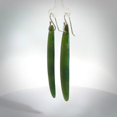 These are stunning large drop shaped jade earrings carved in New Zealand by Josey Coyle. It is carved from a apple green piece of New Zealand Jade and with Sterling Silver hooks.