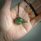 Hand carved Jade kiwi pendant for lovers of birds. Hand made kiwi necklace with black adjustable cord. Unique gifts and Art to Wear by NZ Pacific.