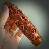 A traditional hand carved Māori Kōauau flute. This piece is made from bone and is a fully functioning musical instrument and can be played. Beautiful ethnic art hand made by NZ Pacific. One only traditional flute by Yuri Terenyi.