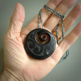 Hand made large New Zealand Pounamu, Jade Koru pendant. Hand carved in New Zealand by Rueben Tipene. Hand made jewellery. Unique large Greenstone Koru with adjustable cobalt blue/maui blue cord. Free shipping worldwide.