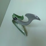 Hand carved large New Zealand Jade and Argillite Matau, hook carving displayed in a New Zealand Inanga Pounamu stand sculpture. Hand carved here in New Zealand by Kerry Thompson. This is a 'one only' sculpture, a beautiful display piece.