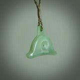 Hand carved New Zealand jade dog whistle. Carved for NZ Pacific by master carver Ross Crump. Jade dog whistle pendant.