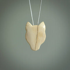 These are small puma cub pendants. They are hand carved from Mammoth tusk and are beautiful. We provide it with a hand plaited cord. Shipping is free worldwide.