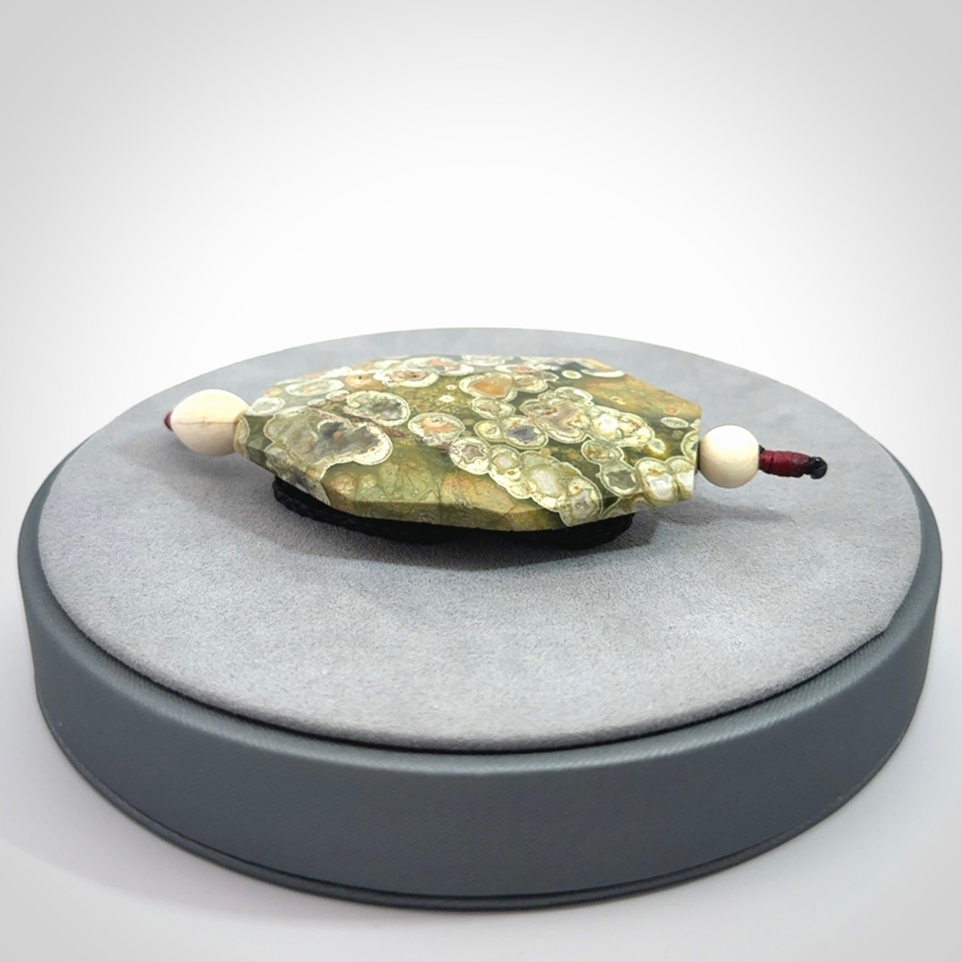 Hand carved American Jasper Stone contemporary drop pendant. Carved by NZ Pacific in Jasper Stone. This is a modern drop pendant made from natural materials.