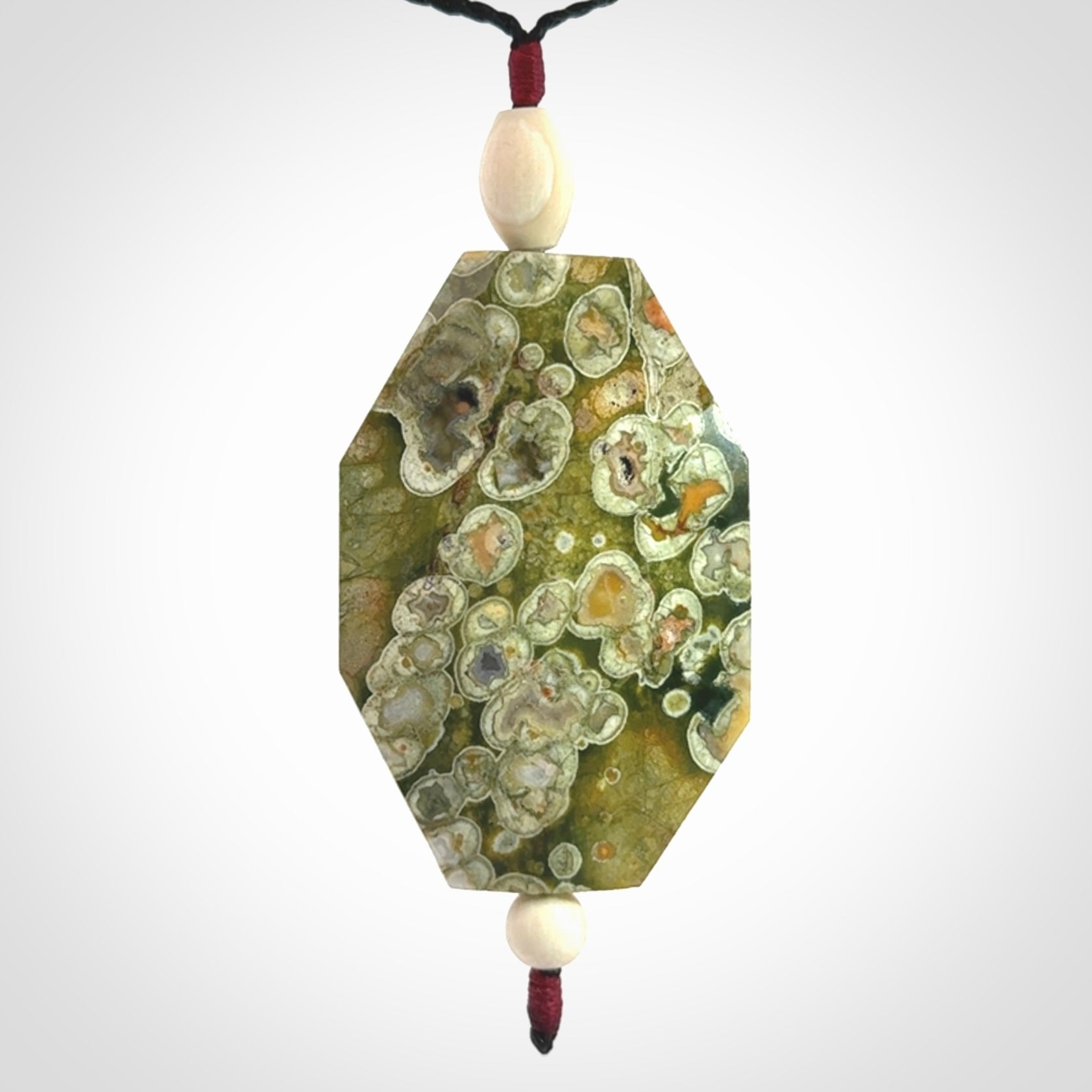 Hand carved American Jasper Stone contemporary drop pendant. Carved by NZ Pacific in Jasper Stone. This is a modern drop pendant made from natural materials.