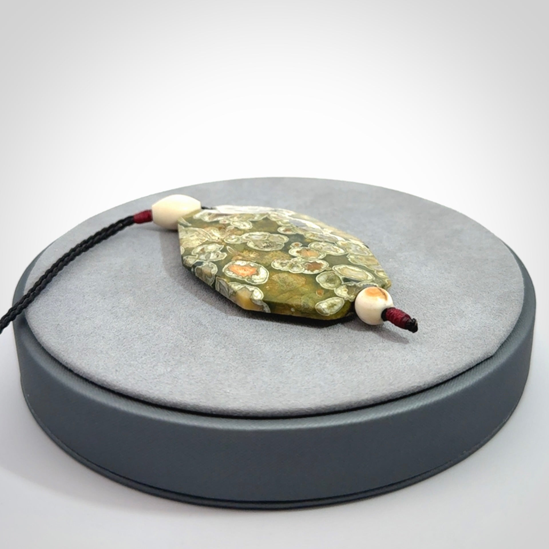 Hand carved American Jasper Stone contemporary drop pendant. Carved by NZ Pacific in Jasper Stone. This is a modern drop pendant made from natural materials.