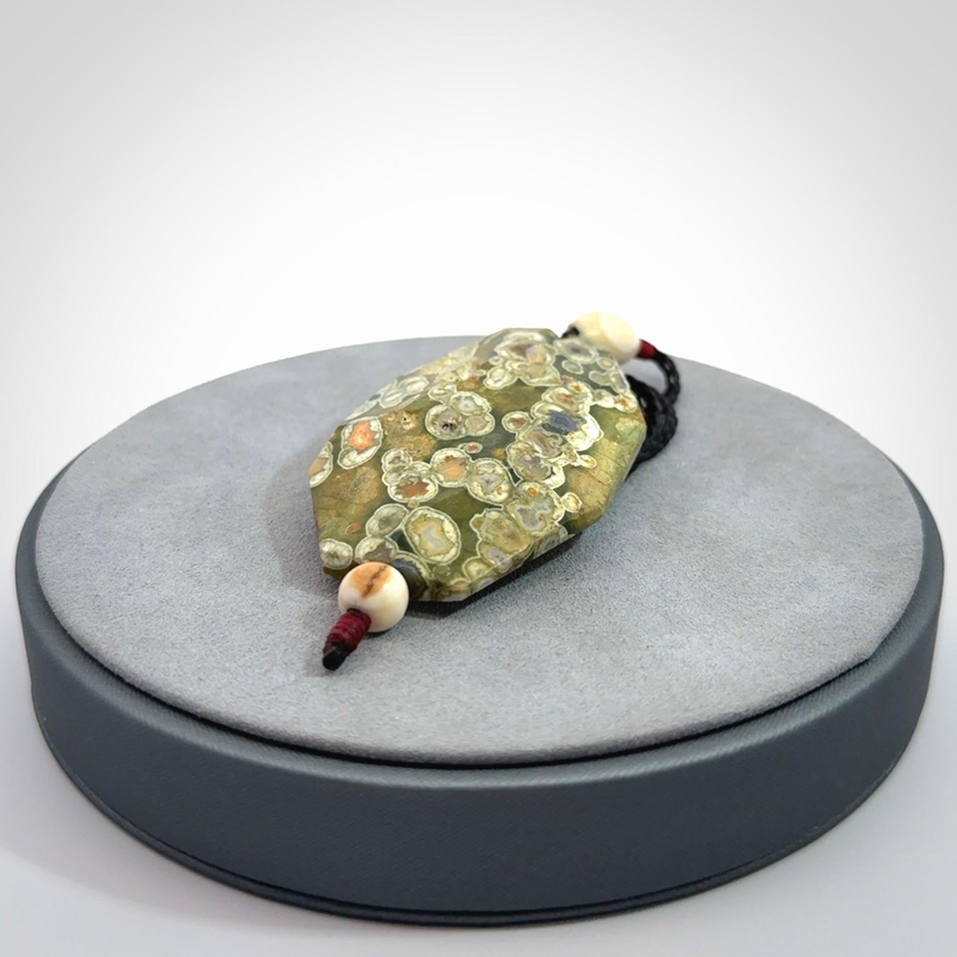 Hand carved American Jasper Stone contemporary drop pendant. Carved by NZ Pacific in Jasper Stone. This is a modern drop pendant made from natural materials.
