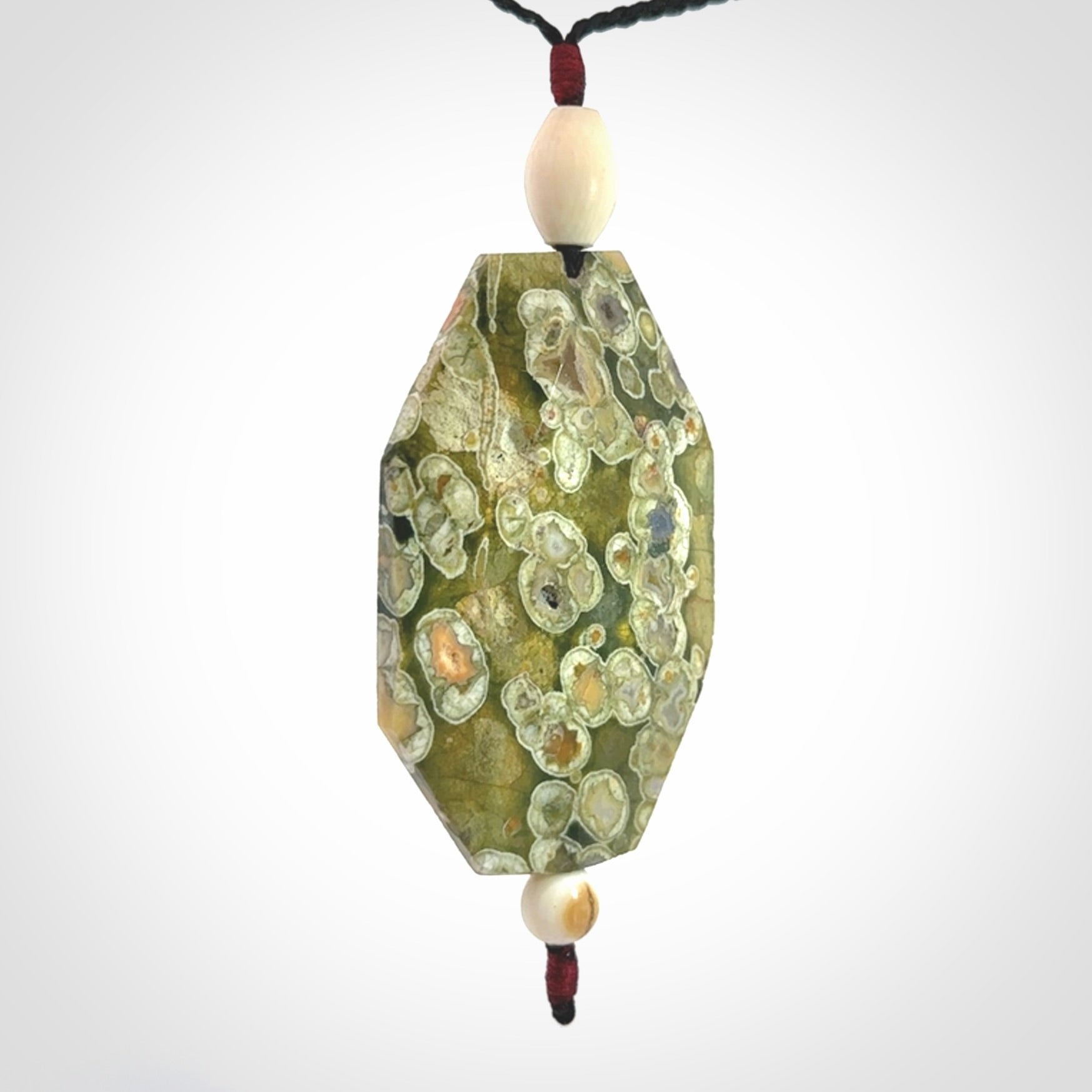 Hand carved American Jasper Stone contemporary drop pendant. Carved by NZ Pacific in Jasper Stone. This is a modern drop pendant made from natural materials.