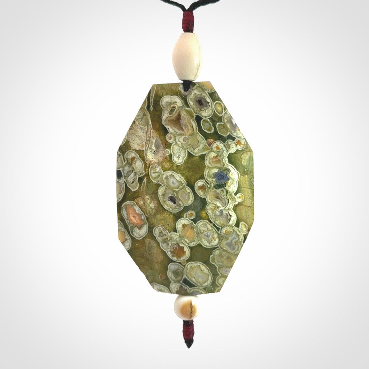 Hand carved American Jasper Stone contemporary drop pendant. Carved by NZ Pacific in Jasper Stone. This is a modern drop pendant made from natural materials.