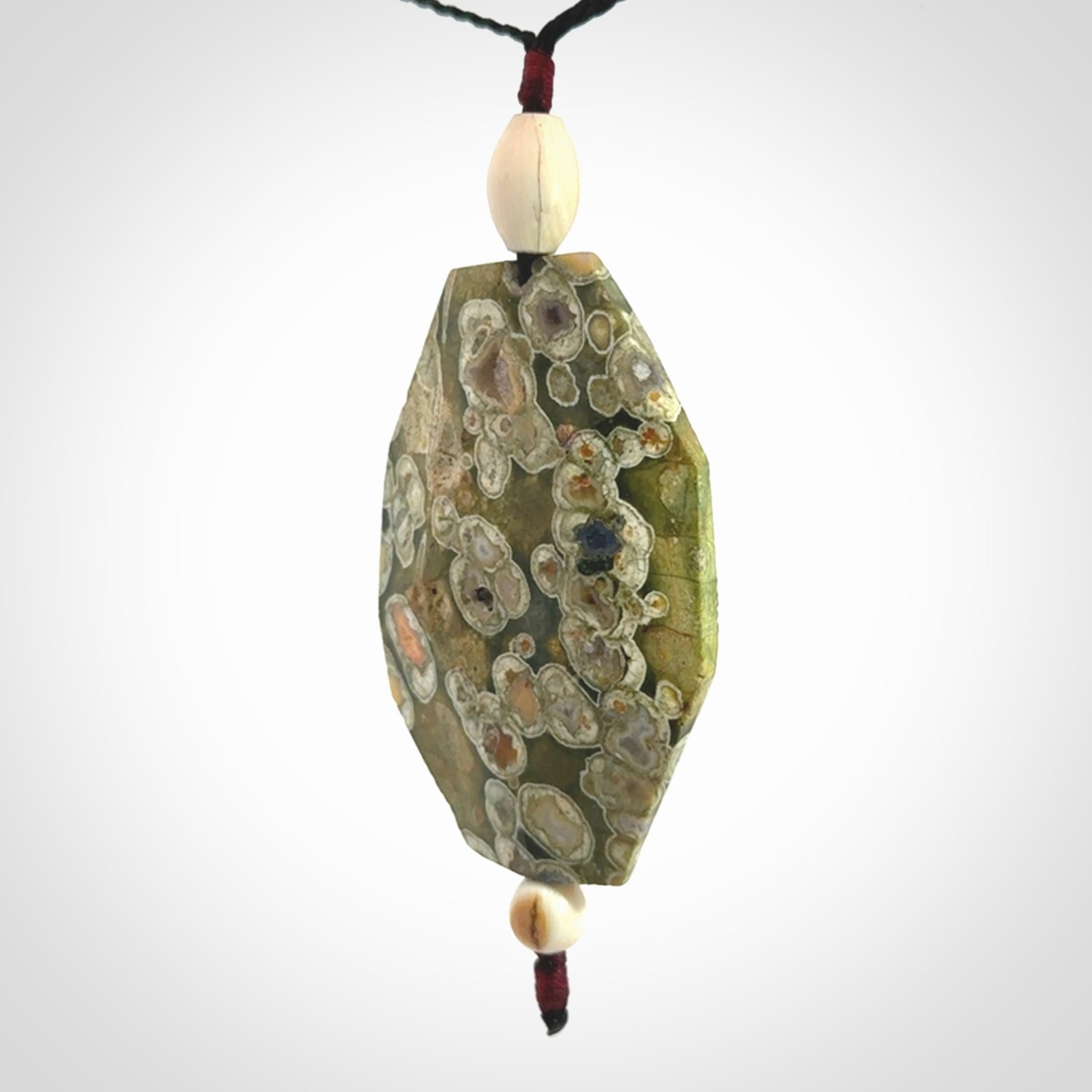 Hand carved American Jasper Stone contemporary drop pendant. Carved by NZ Pacific in Jasper Stone. This is a modern drop pendant made from natural materials.