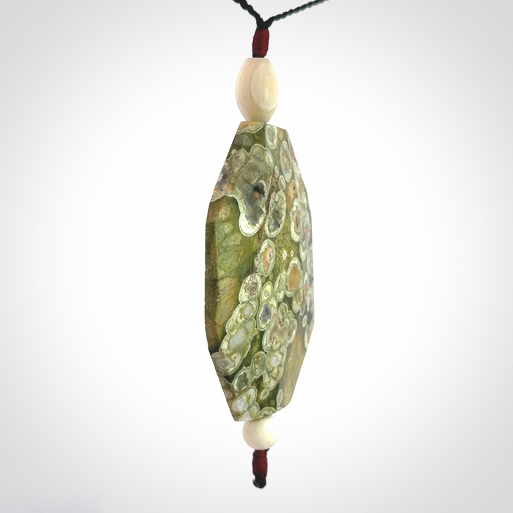 Hand carved American Jasper Stone contemporary drop pendant. Carved by NZ Pacific in Jasper Stone. This is a modern drop pendant made from natural materials.