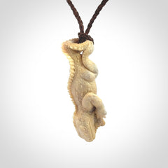 Hand carved deer antler Tuatara pendant.