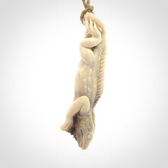 Hand carved deer antler Tuatara pendant.
