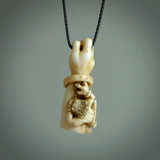 Hand carved Rashōmon Pendant. Made from Red Deer antler in New Zealand. Unique Japanese necklace hand made from deer antler by master bone carver Fumio Noguchi. Spectacular collectable work of art, made to wear. One only pendant, delivered to you at no extra cost with express courier.