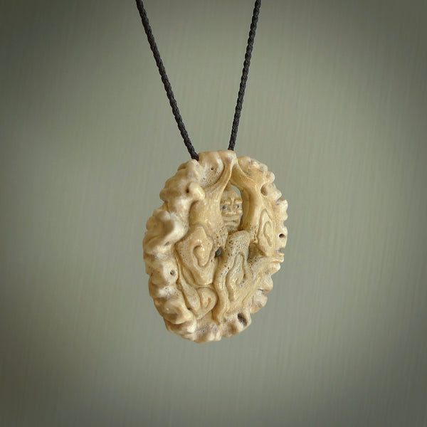 Hand carved Raiden Pendant. Made from Red Deer antler in New Zealand. Unique Japanese necklace hand made from deer antler by master bone carver Fumio Noguchi. Spectacular collectable work of art, made to wear. One only pendant, delivered to you at no extra cost with express courier.