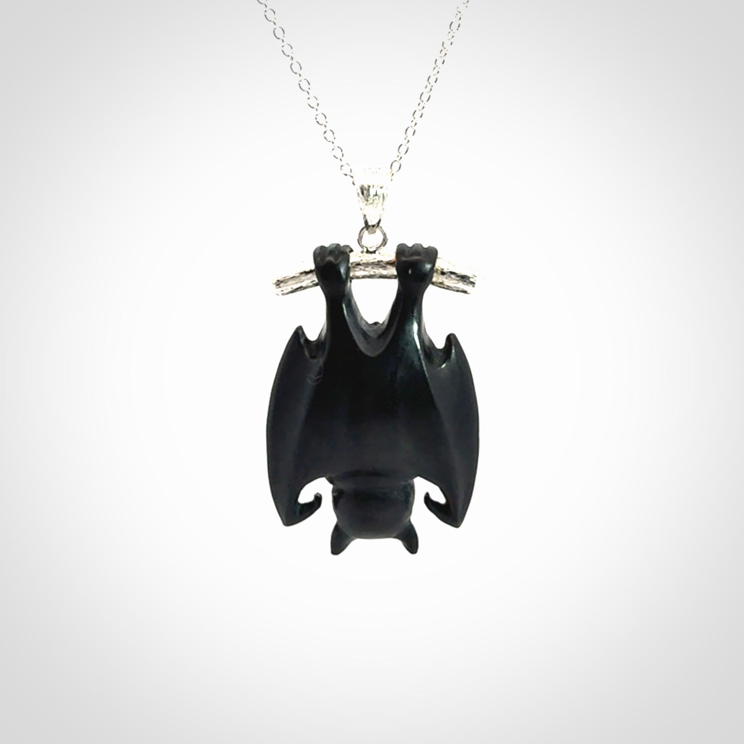 Hand carved black jade bat pendant with sterling silver