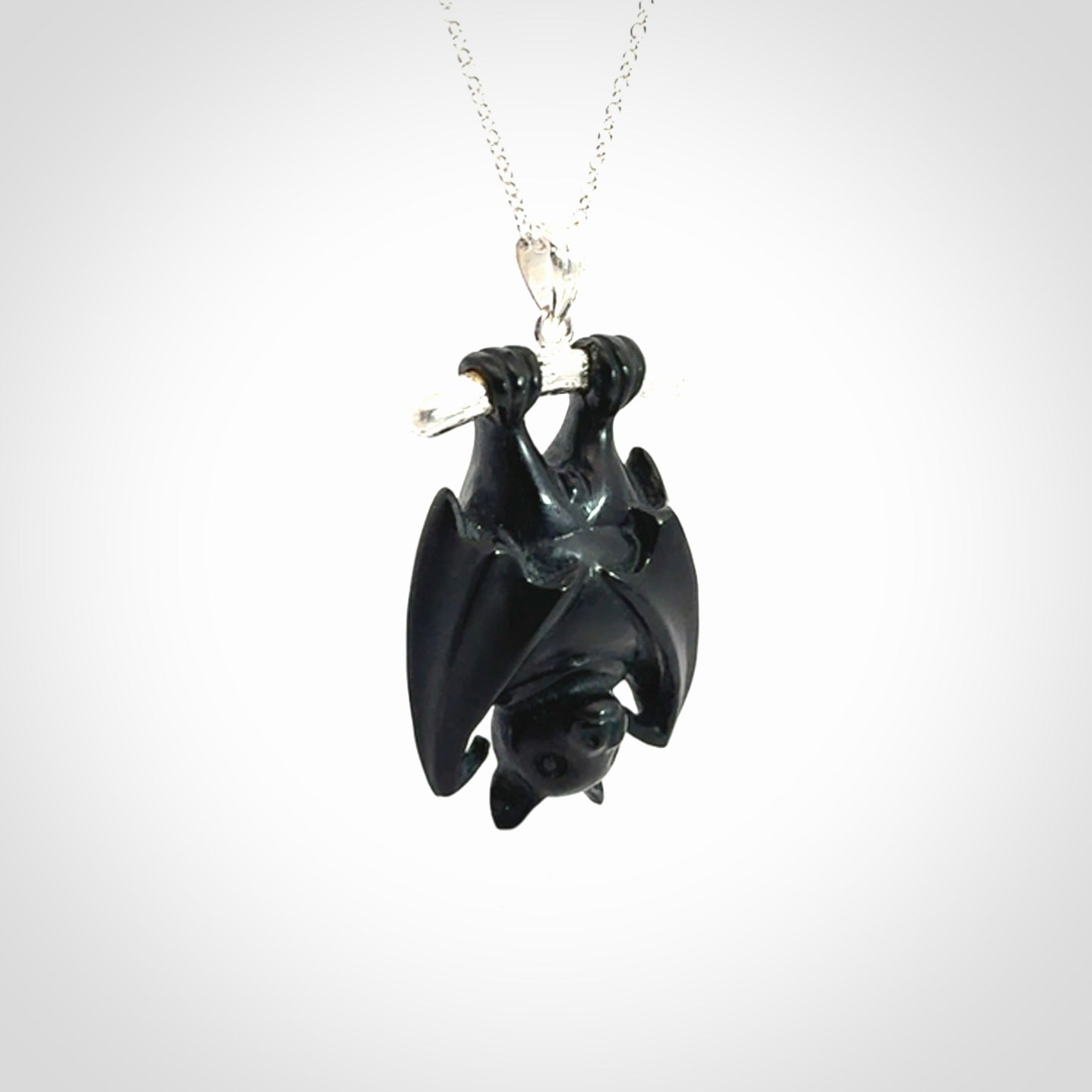 Hand carved black jade bat pendant with sterling silver