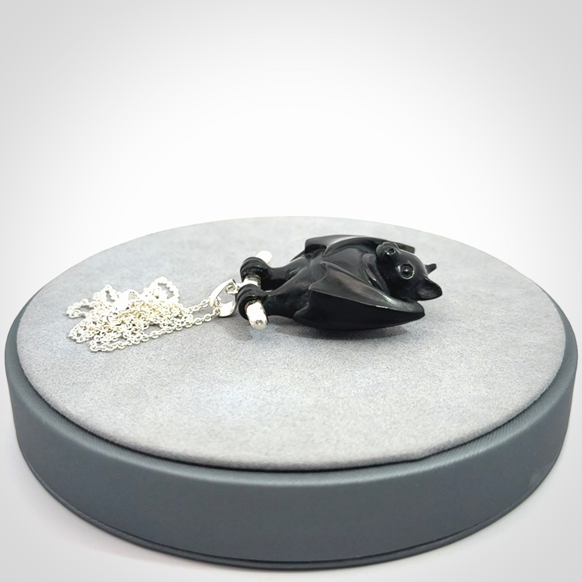 Hand carved black jade bat pendant with sterling silver