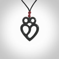 This is a hand carved love heart pendant made from a gorgeous and striking piece of Black Jade stone. This is a superbly carved and very unique piece if custom jewellery. For sale online from NZ Pacific.
