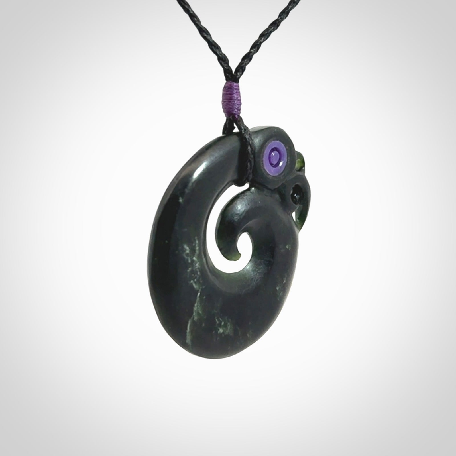 New Zealand Koru Manaia. Hand carved koropepe pendant. Made in New Zealand. Real Jade, pounamu.