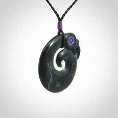New Zealand Koru Manaia. Hand carved koropepe pendant. Made in New Zealand. Real Jade, pounamu.