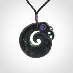 New Zealand Koru Manaia. Hand carved koropepe pendant. Made in New Zealand. Real Jade, pounamu.
