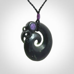 New Zealand Koru Manaia. Hand carved koropepe pendant. Made in New Zealand. Real Jade, pounamu.