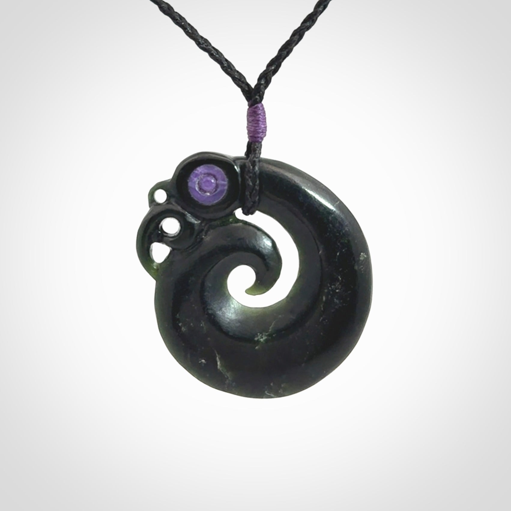 New Zealand Koru Manaia. Hand carved koropepe pendant. Made in New Zealand. Real Jade, pounamu.