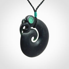 New Zealand Koru Manaia. Hand carved koropepe pendant. Made in New Zealand. Real Tangiwai, pounamu.