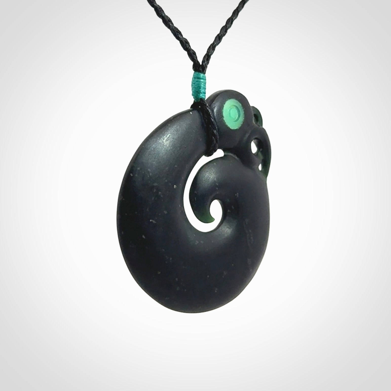 New Zealand Koru Manaia. Hand carved koropepe pendant. Made in New Zealand. Real Tangiwai, pounamu.