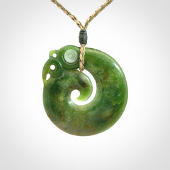 New Zealand Koru Manaia. Hand carved koropepe pendant. Made in New Zealand. Real Jade, pounamu.