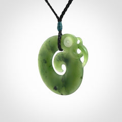 New Zealand Koru Manaia. Hand carved koropepe pendant. Made in New Zealand. Real Jade, pounamu.