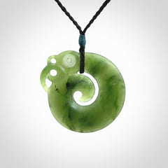 New Zealand Koru Manaia. Hand carved koropepe pendant. Made in New Zealand. Real Jade, pounamu.