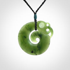 New Zealand Koru Manaia. Hand carved koropepe pendant. Made in New Zealand. Real Jade, pounamu.