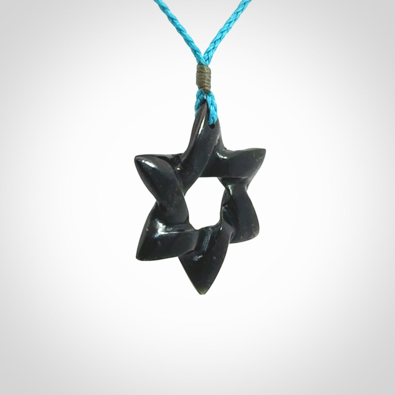 Hand carved New Zealand Tangiwai Magen David pendant