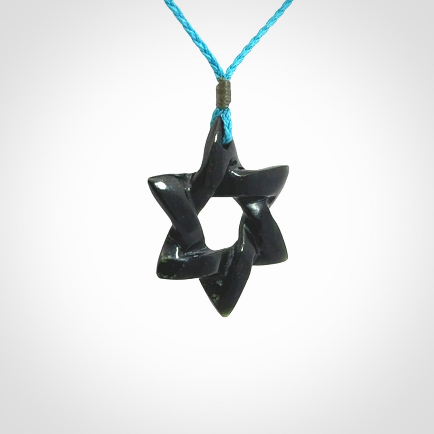 Hand carved New Zealand Tangiwai Magen David pendant