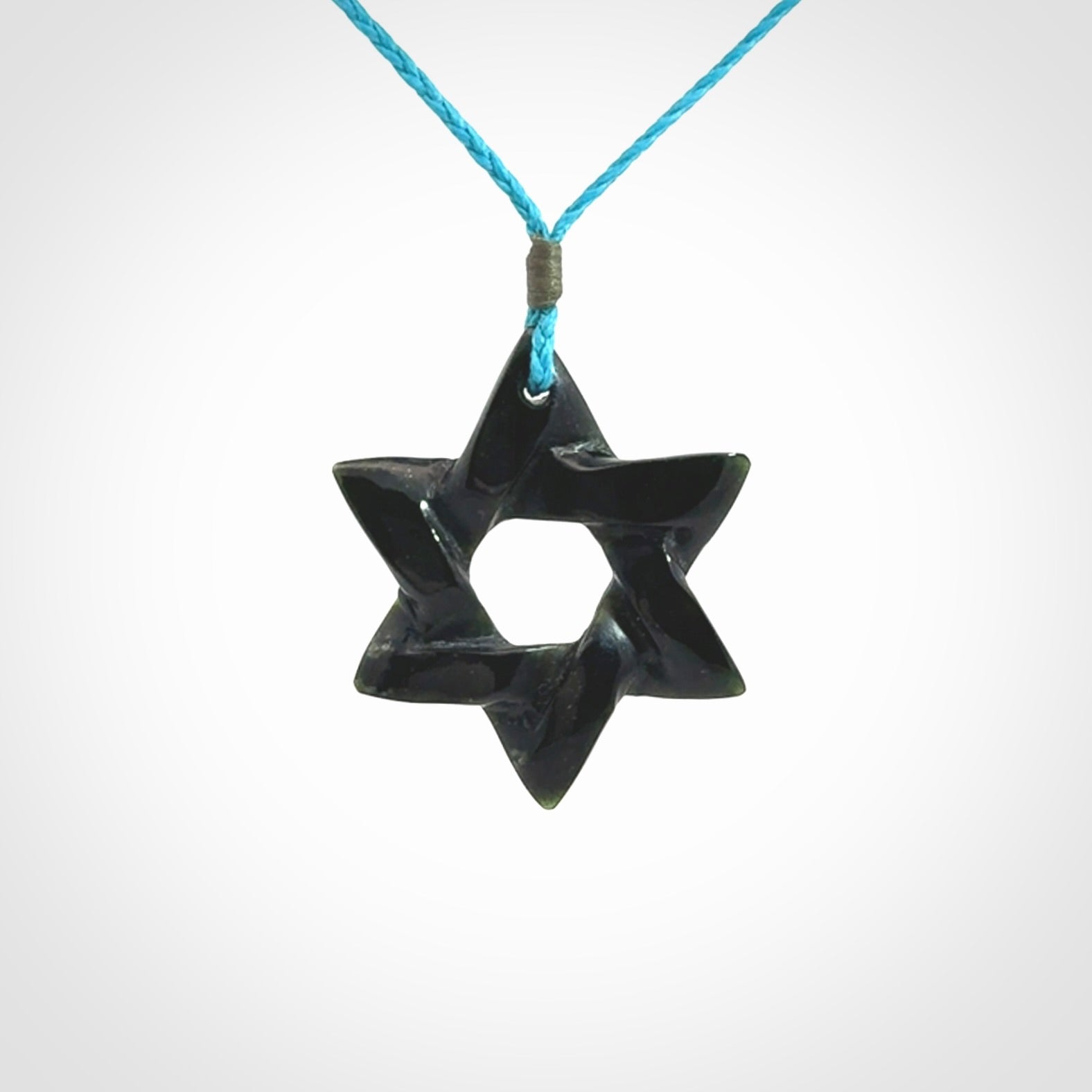 Hand carved New Zealand Tangiwai Magen David pendant