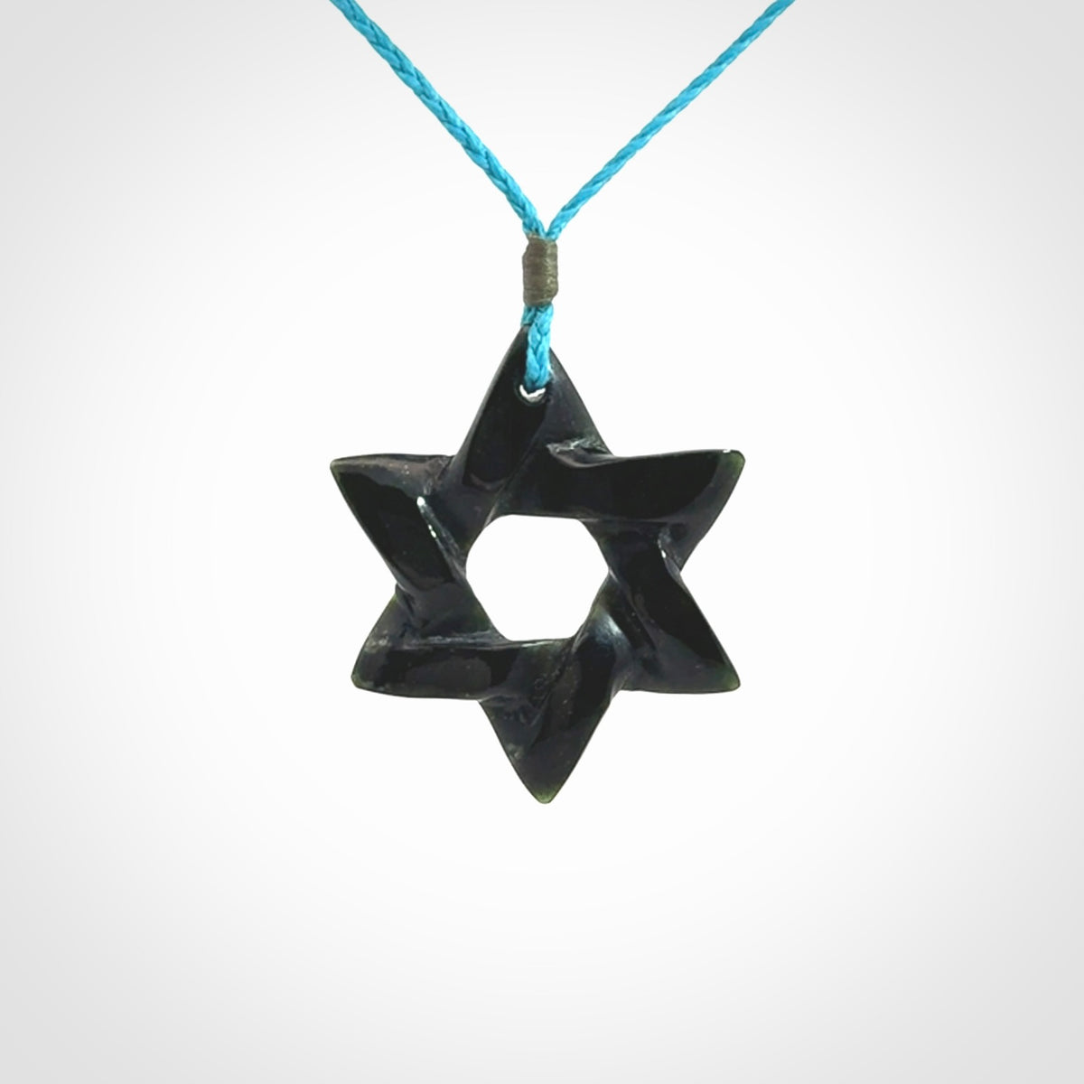 Hand carved New Zealand Tangiwai Magen David pendant