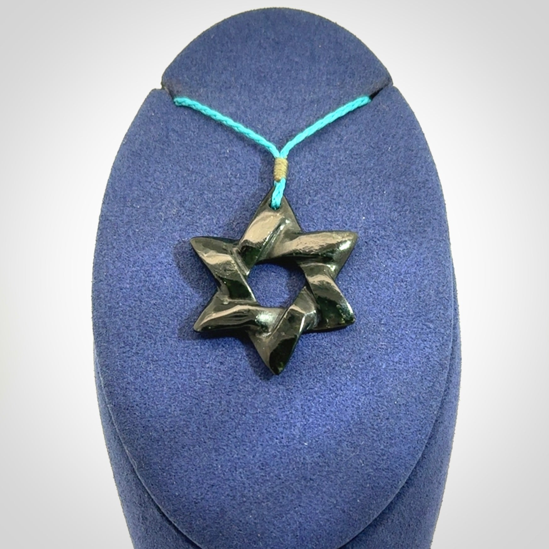 Hand carved New Zealand Tangiwai Magen David pendant