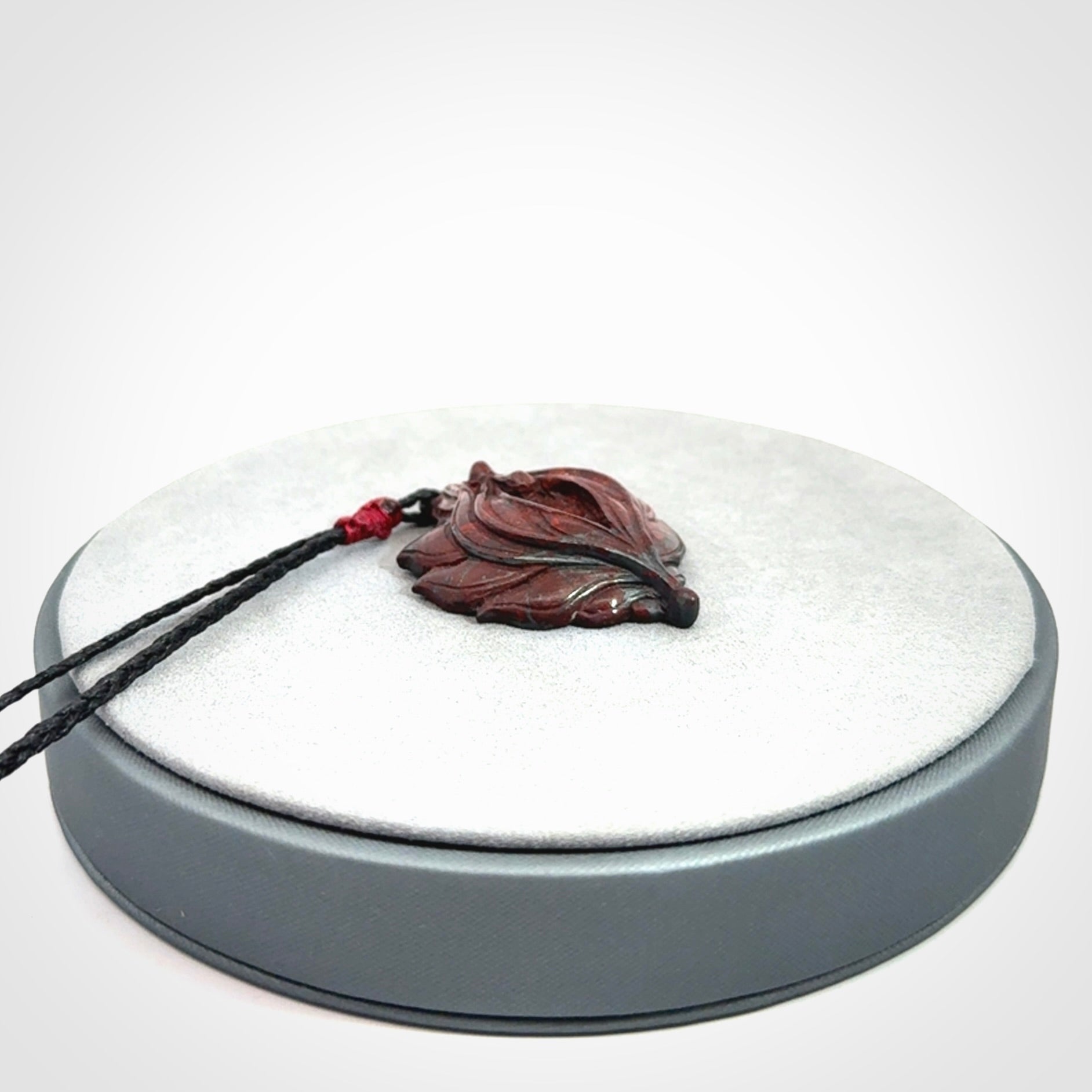 Hand carved jasper stone flower bud pendant